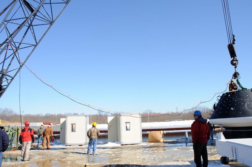 Crew Module Water Landing Model Assessment