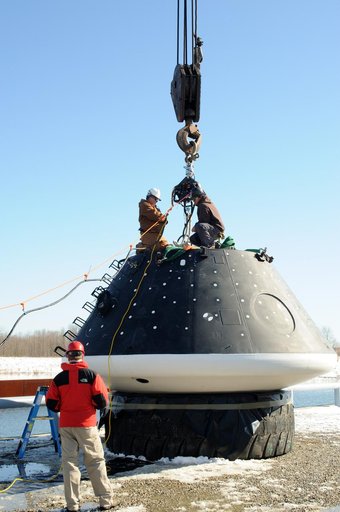 Crew Module Water Landing Model Assessment