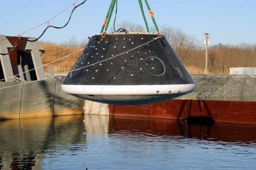 Crew Module Water Landing Model Assessment