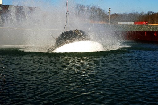 Crew Module Water Landing Model Assessment