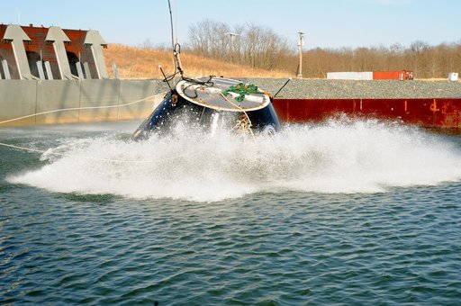 Crew Module Water Landing Model Assessment
