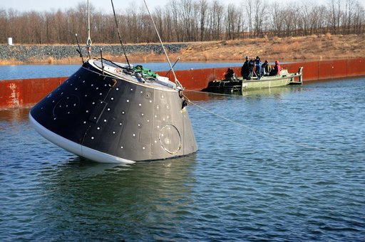 Crew Module Water Landing Model Assessment