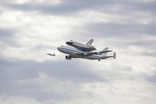 Space Shuttle Discovery mounted atop a NASA 747 Shuttle Carrier