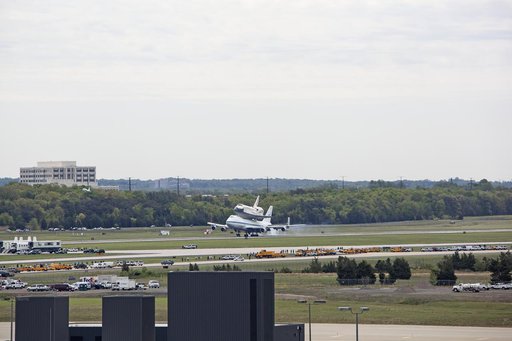 Space Shuttle Discovery mounted atop a NASA 747 Shuttle Carrier