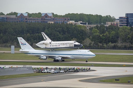 Space Shuttle Discovery mounted atop a NASA 747 Shuttle Carrier