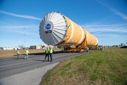 NASA Moves First Artemis SLS Rocket Stage from NASA’s Factory to Barge