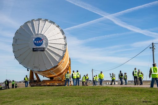 NASA Moves First Artemis SLS Rocket Stage from NASA’s Factory to Barge