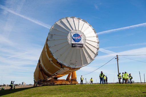 NASA Moves First Artemis SLS Rocket Stage from NASA’s Factory to Barge