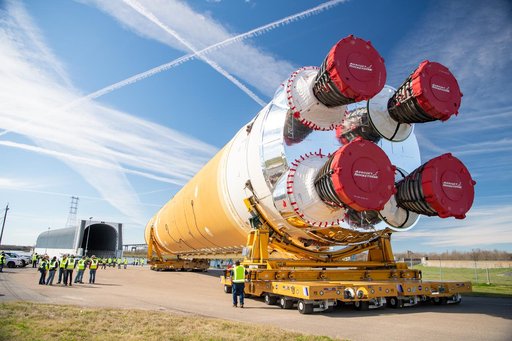 NASA Moves First Artemis SLS Rocket Stage from NASA’s Factory to Barge