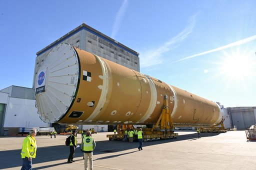 NASA Moves First Artemis SLS Rocket Stage from NASA’s Factory to Barge