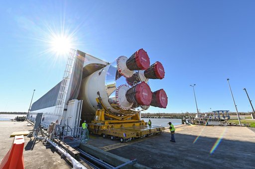 NASA Moves First Artemis SLS Rocket Stage from NASA’s Factory to Barge