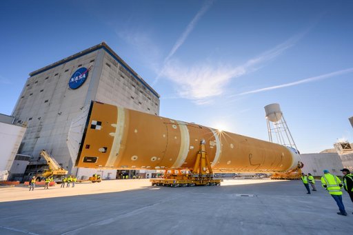 NASA Moves First Artemis SLS Rocket Stage from NASA’s Factory to Barge