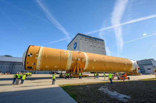 NASA Moves First Artemis SLS Rocket Stage from NASA’s Factory to Barge
