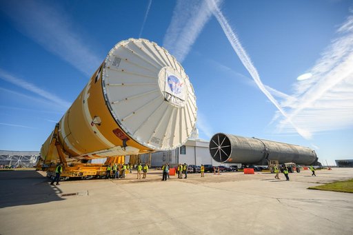 NASA Moves First Artemis SLS Rocket Stage from NASA’s Factory to Barge