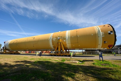NASA Moves First Artemis SLS Rocket Stage from NASA’s Factory to Barge