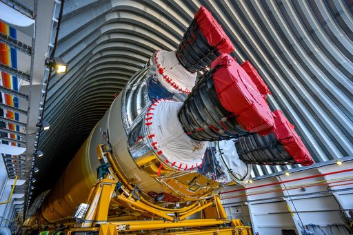 NASA Moves First Artemis SLS Rocket Stage from NASA’s Factory to Barge