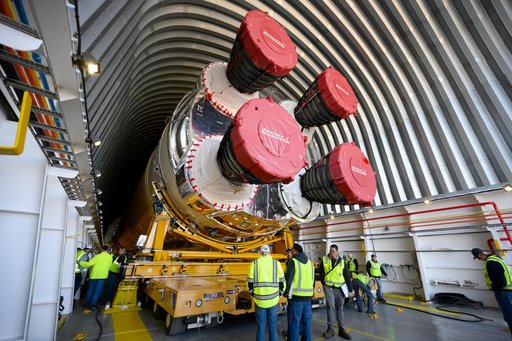 NASA Moves First Artemis SLS Rocket Stage from NASA’s Factory to Barge
