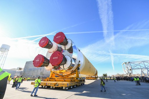 NASA Moves First Artemis SLS Rocket Stage from NASA’s Factory to Barge