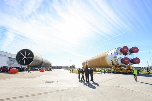 NASA Moves First Artemis SLS Rocket Stage from NASA’s Factory to Barge