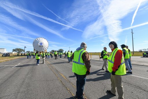 NASA Moves First Artemis SLS Rocket Stage from NASA’s Factory to Barge