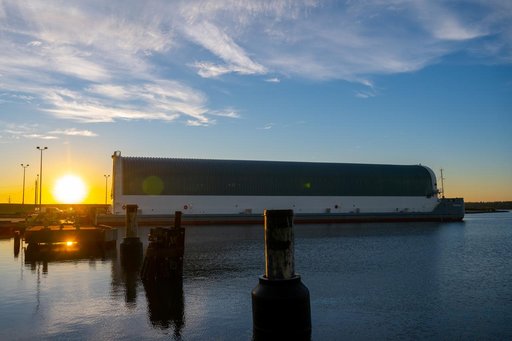 NASA teams load SLS Engine Section for Artemis III mission on Pegasus barge