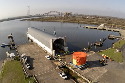 NASA teams load SLS Engine Section for Artemis III mission on Pegasus barge