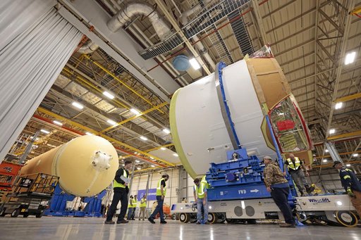 Teams Move Artemis II SLS Engine Section into Position for Final Join