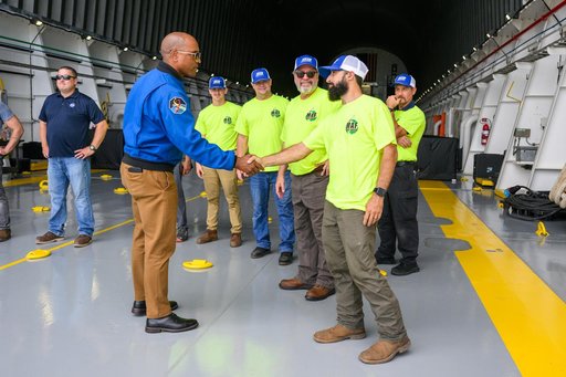 NASA Astronaut Victor Glover Views Artemis II Rocket Stage at NASA Michoud