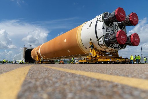 Space Launch System Core Stage for Artemis II Rocket Loaded onto Pegasus Barge