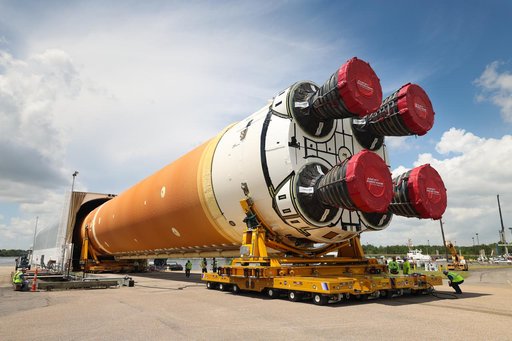 Space Launch System Core Stage for Artemis II Rocket Loaded onto Pegasus Barge