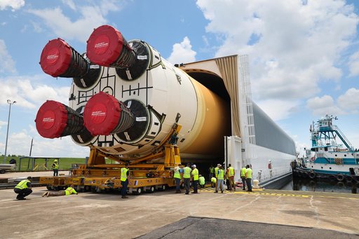 Space Launch System Core Stage for Artemis II Rocket Loaded onto Pegasus Barge