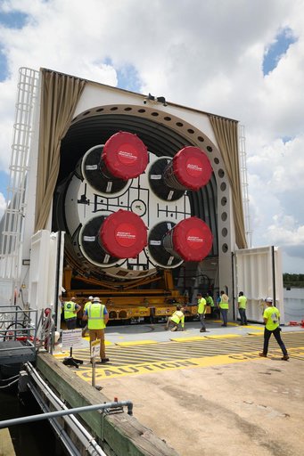 Space Launch System Core Stage for Artemis II Rocket Loaded onto Pegasus Barge