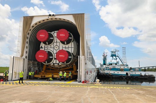 Space Launch System Core Stage for Artemis II Rocket Loaded onto Pegasus Barge