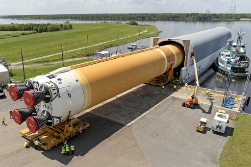 Space Launch System Core Stage for Artemis II Rocket Loaded onto Pegasus Barge