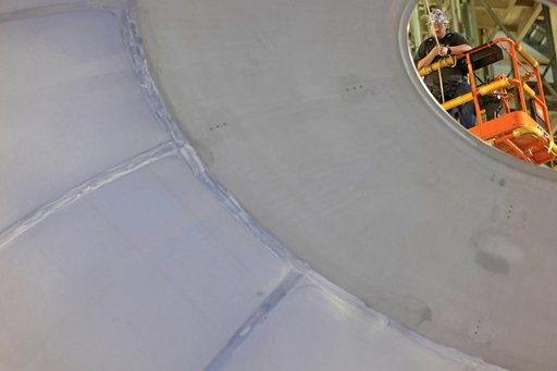 Core Stage Four Liquid Hydrogen Tank Aft Dome Lifts into Vertical Assembly Center