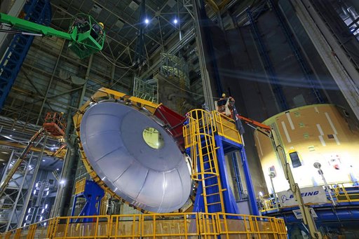 Core Stage Four Liquid Hydrogen Tank Aft Dome Lifts into Vertical Assembly Center