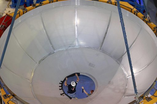 Core Stage Four Liquid Hydrogen Tank Aft Dome Lifts into Vertical Assembly Center