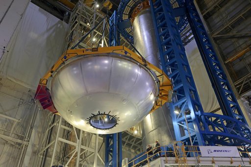 Core Stage Four Liquid Hydrogen Tank Aft Dome Lifts into Vertical Assembly Center