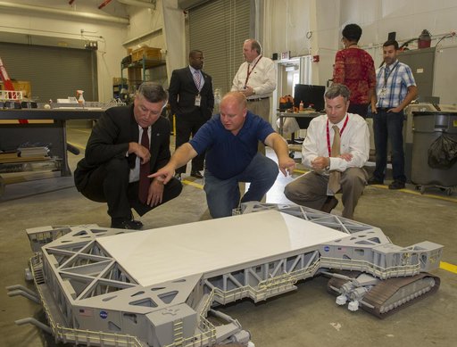 MSFC center director, Patrick Scheuermann, tours the center model shop