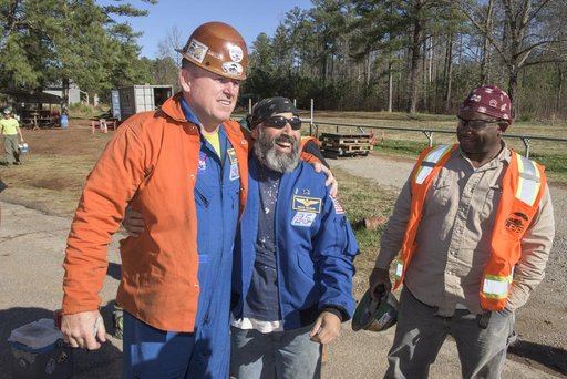 Butch Wilmore with construction worker