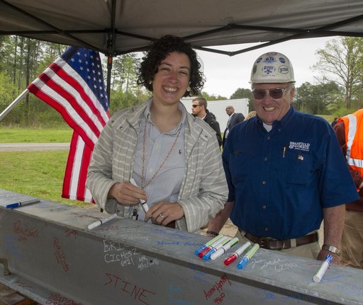 JENNIFER PRUITT AND BUDDY CLARK AT 4693 TOPPING OUT
