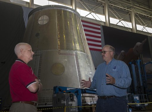 RICK BURT AND ANDY SCHORR WITH LAUNCH VEHICLE STAGE ADAPTER