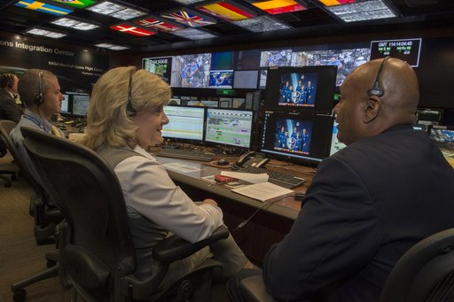 Jody Singer, MSFC deputy director, and Bobby Watkins visit the P