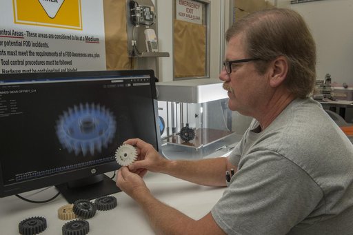 Phillip Steele with composite material gears