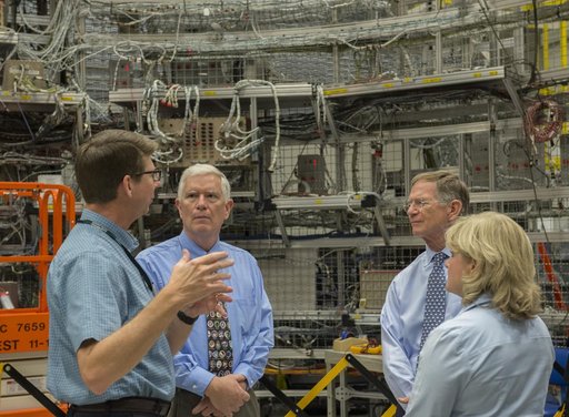 U.S. Representatives Mo Brooks and Lamar Smith tour Marshall Space Flight Center facilities