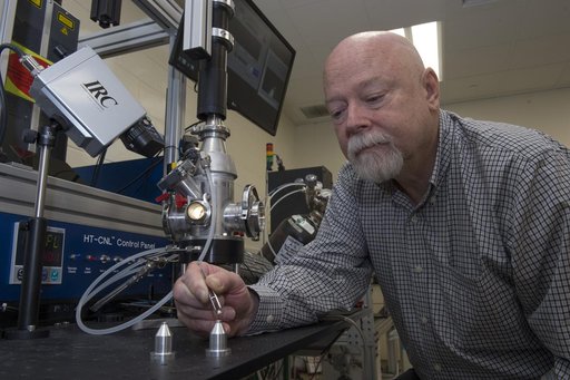 Dr. Douglas Matson (Tufts University) working with an aerodyna