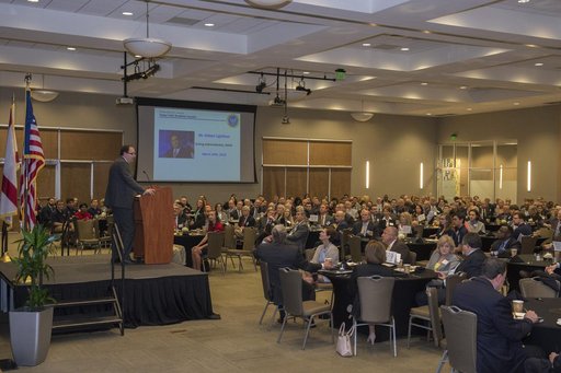 NASA Acting Administrator Robert Lightfoot addresses members of the National Space Club at a breakfast meeting in the Jackson Conference Center in Huntsville, Alabama.