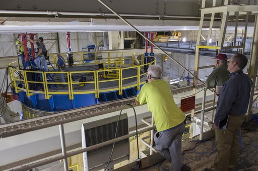 SLS Intertank Test Article, ITA, is attached to crosshead of load testAnnex, Bldg. 4619, and removed from bed of KMAG transporter