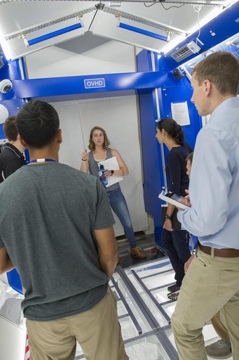 Boeing trainers conduct simulations inside the Boeing Exploratio