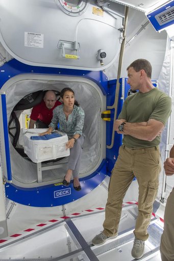 Boeing trainers conduct simulations inside the Boeing Exploratio